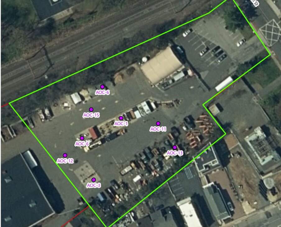 Area of Concern map: eight documented contamination points inside the proposed development footprint